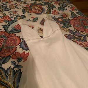 David’s bridal wedding dress with tags, never worn. Size 2. Beachy, tea length